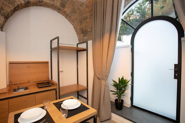 San Nicola Room: kitchenette and door to the terrace