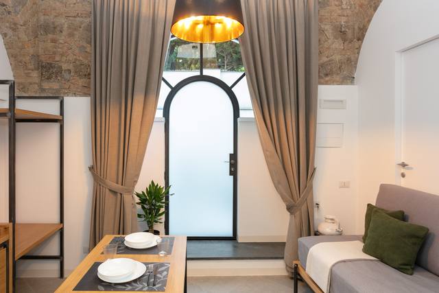 San Nicola Room: dining table and French door