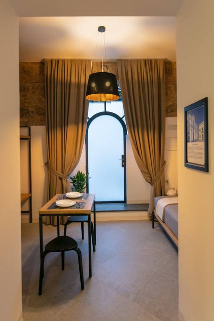 San Nicola Room: table by the arched window